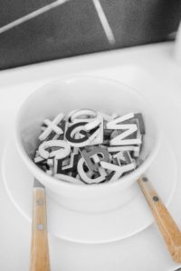 Letters in a bowl, illustrating how important it is to have the ability to visually discriminate objects.  This is all connected to the ability to match, which is important to introduce during the early years of childhood development.